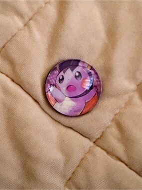 Pokemon Purple Character Pin Button with Pink and Orange Accents